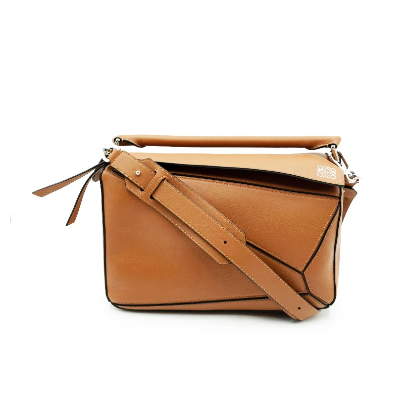 PVC Bucket Bag in Clear with Glitter Accents for a Fun and Edgy StyleMedium Puzzle Bag in Classic Calfskin in Tan