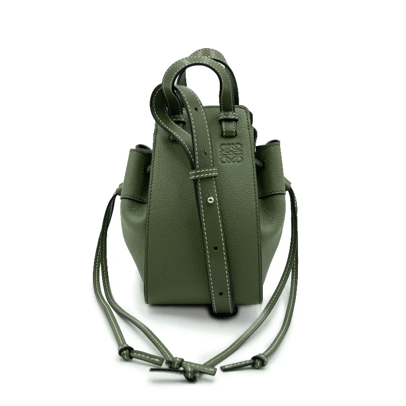 Women's Quilted Bucket Bag in Black with Silver Hardware for a Classic and Timeless StyleMini Hammock Drawstring Bag in Soft Grained Calf in Avocado Green