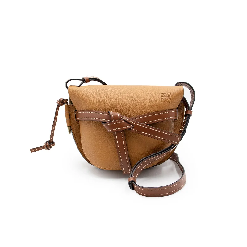 Canvas and Leather - Trimmed Bucket Bag in Beige for a Casual Weekend GetawaySmall Gate Bag in Soft Grained Calfskin in Caramel/Pecan