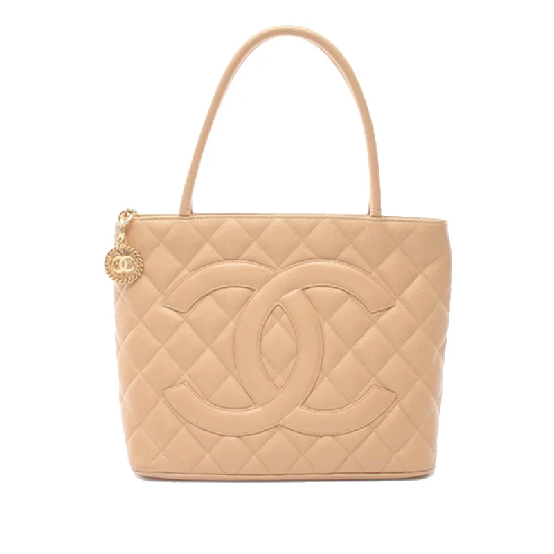 Metallic Tote Bag in Rose Gold with Chain Handles for a Glamorous Night OutBrown Chanel Caviar Medallion Tote