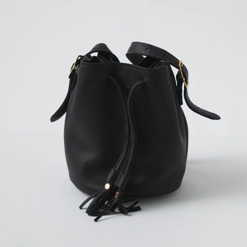 PVC Bucket Bag in Clear with Glitter Accents for a Fun and Edgy StyleBlack Kodiak Bucket Bag