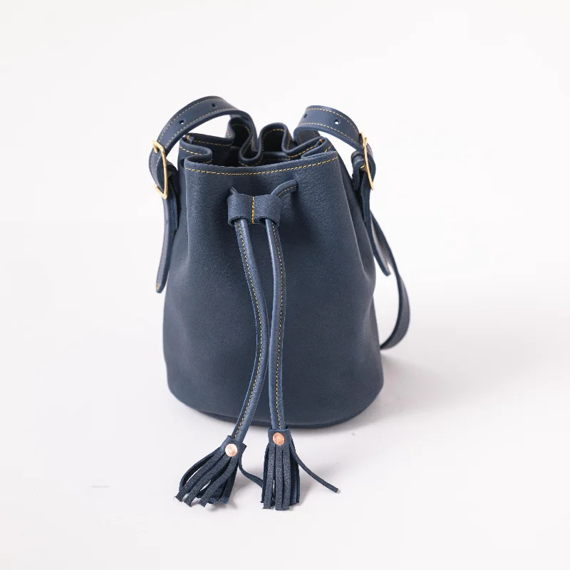 Bucket Bag with Embossed Animal Print in Tan for a Wild and Stylish StatementBlue Cypress Bucket Bag