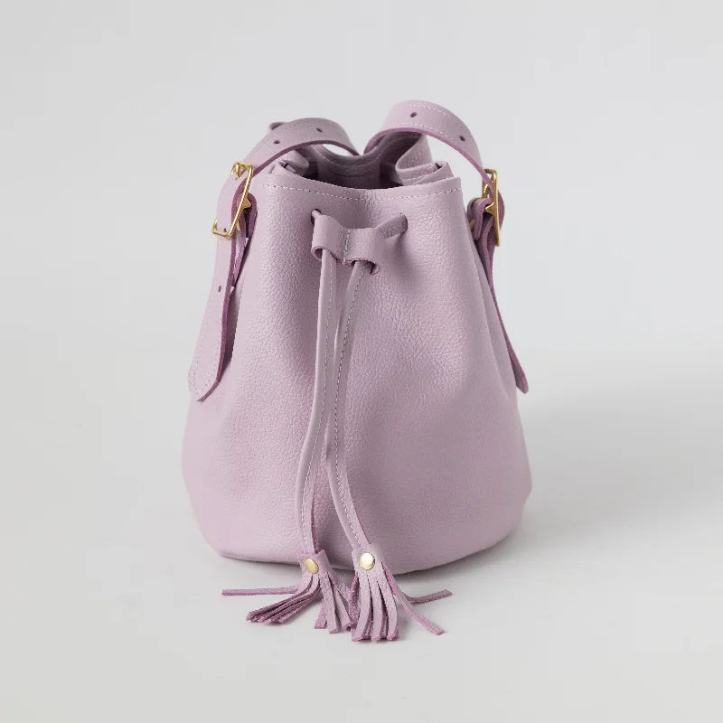 Linen Bucket Bag in Natural Beige with Braided Strap for a Rustic Summer EnsembleLilac Italian Pebbled Bucket Bag