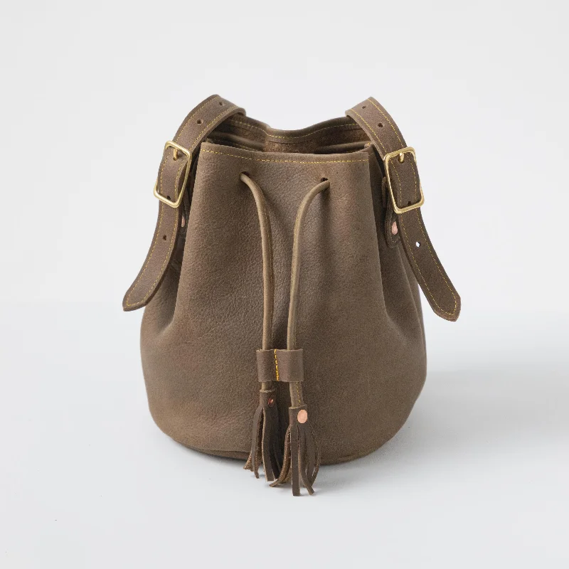 Linen Bucket Bag in Natural Beige with Braided Strap for a Rustic Summer EnsembleOlive Kodiak Bucket Bag