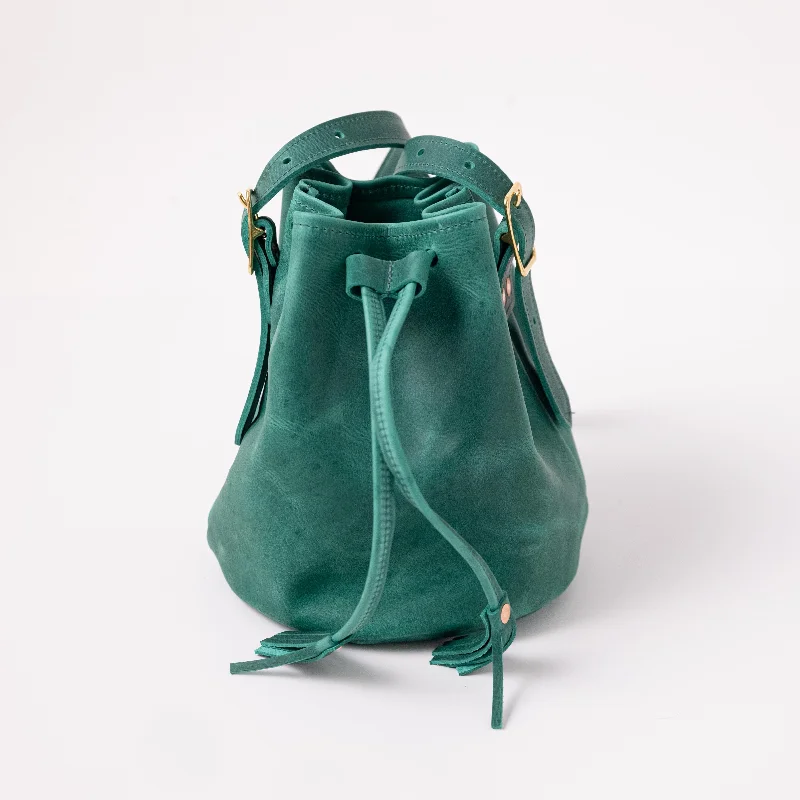 Women's Quilted Bucket Bag in Black with Silver Hardware for a Classic and Timeless StyleTeal Kodiak Bucket Bag